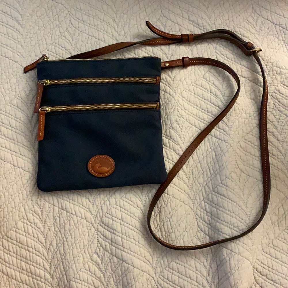 Navy blue dooney and Bourke crossbody bag